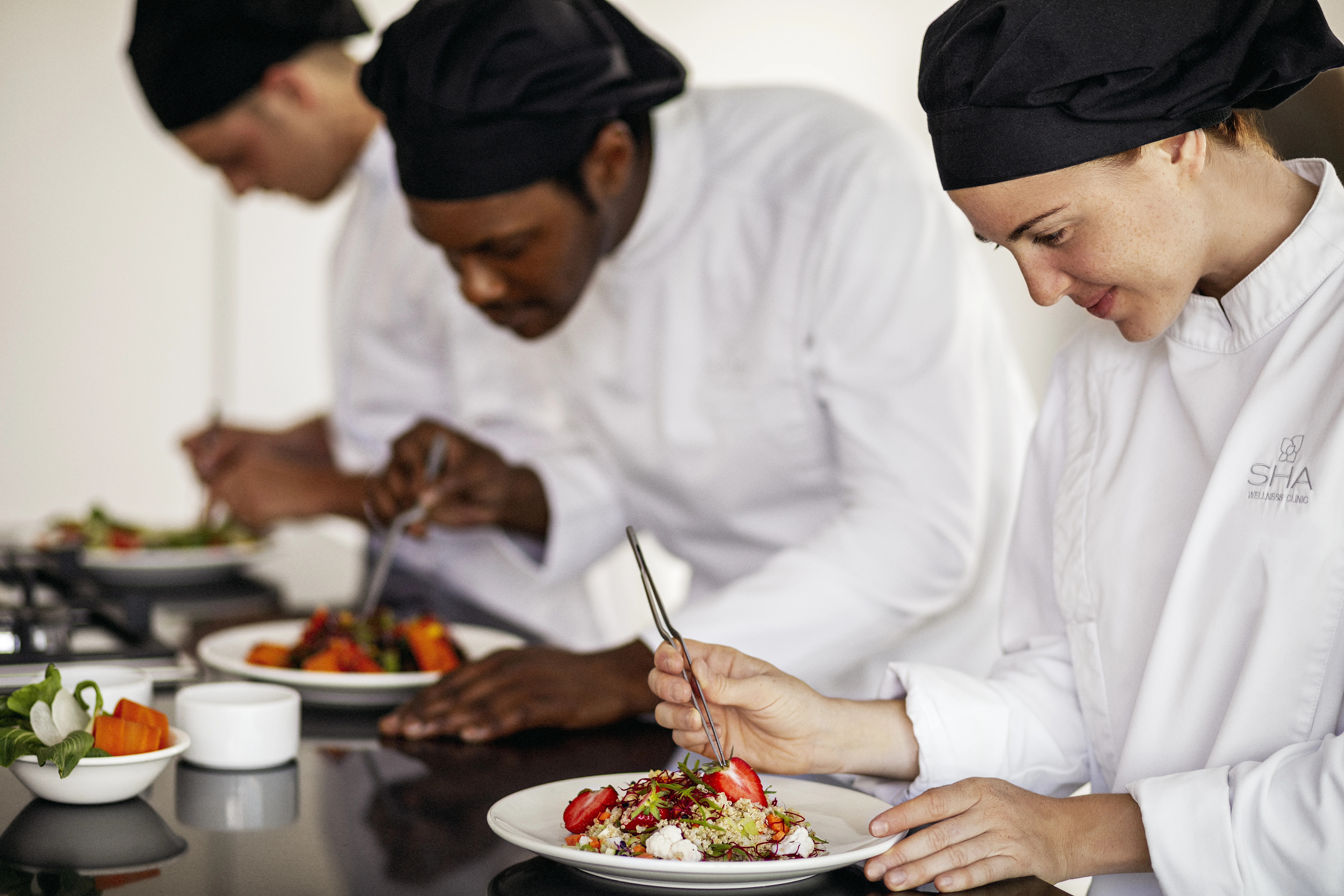 Chefs preparing healthy cuisine at SHA Wellness Clinic