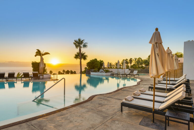 Outdoor pool during sunset at Balance Retreat at Las Terrazas de Abama Suites Resort